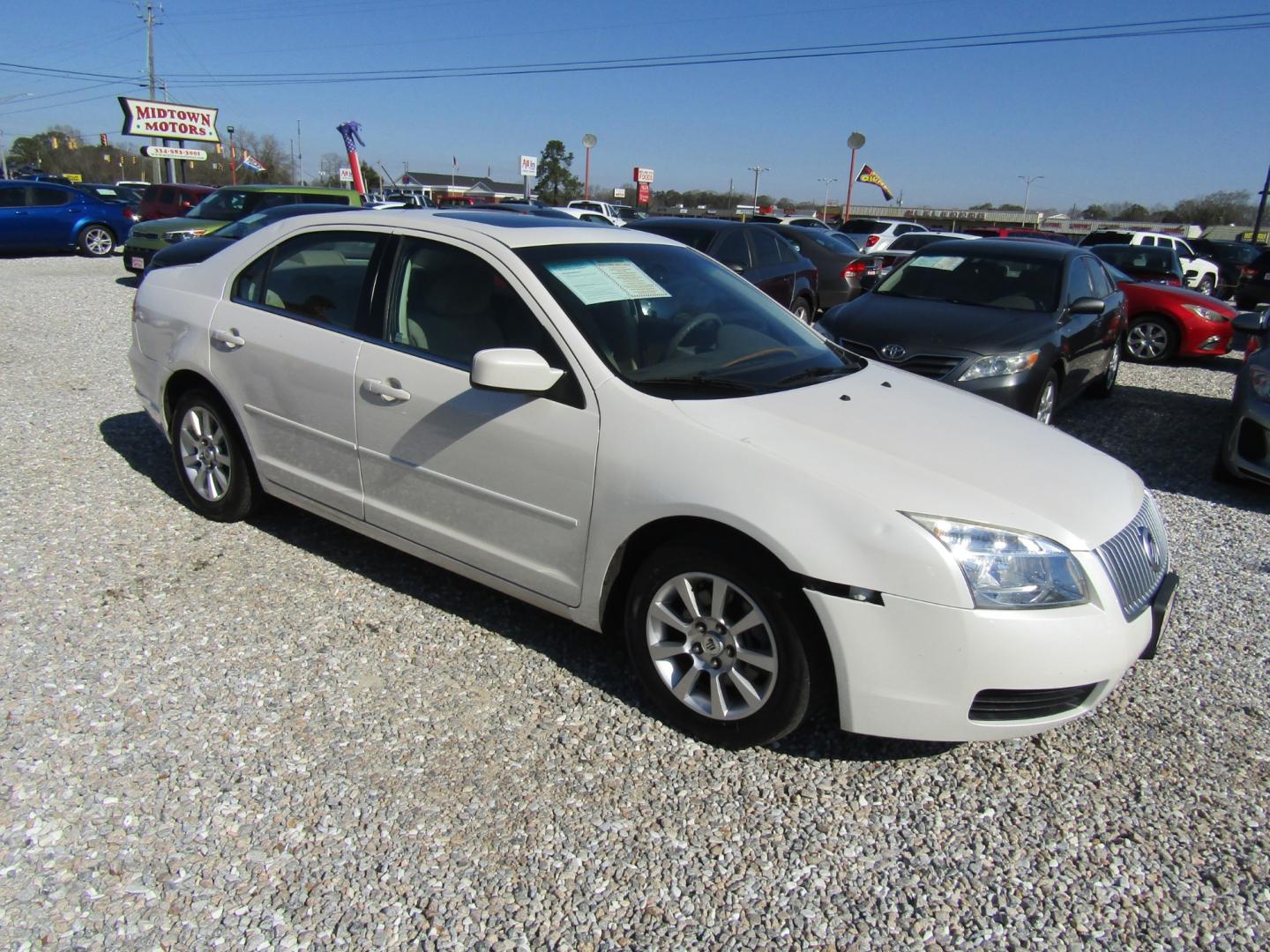 2009 CREAM /Tan Mercury Milan I4 (3MEHM07Z19R) with an 2.3L L4 DOHC 16V engine, Automatic transmission, located at 15016 S Hwy 231, Midland City, AL, 36350, (334) 983-3001, 31.306210, -85.495277 - Photo#0